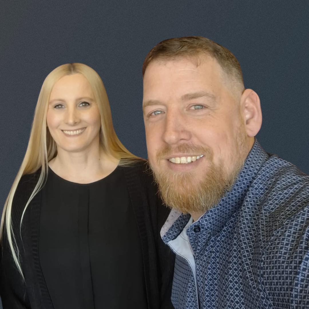 Jamie McAnsh smiling alongside a fellow speaker at the Disability Positive event, celebrating disability empowerment through storytelling.